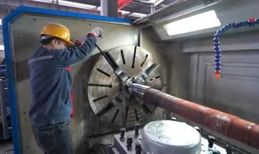Machining a large component on a factory lathe